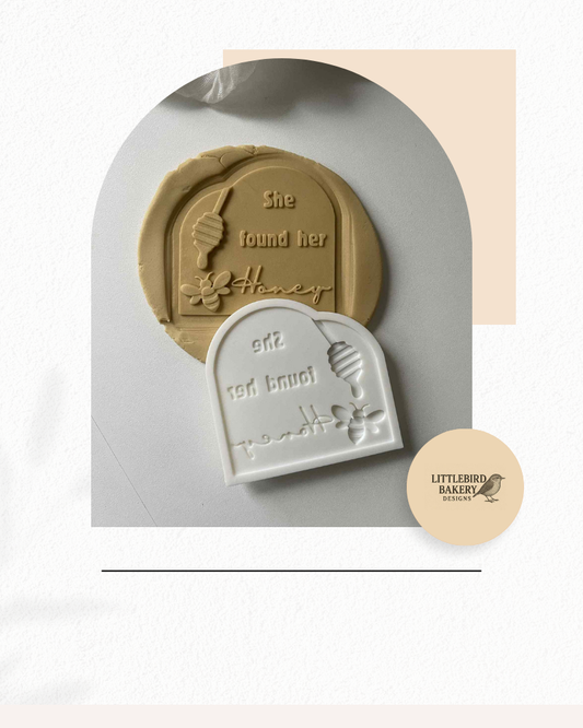 She found her honey arch cookie cutter and stamp