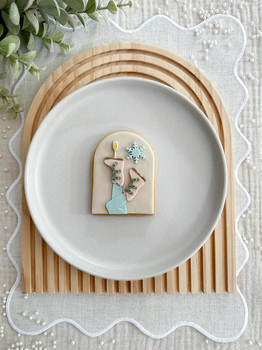 Ski boots with glass cookie cutter and stamp