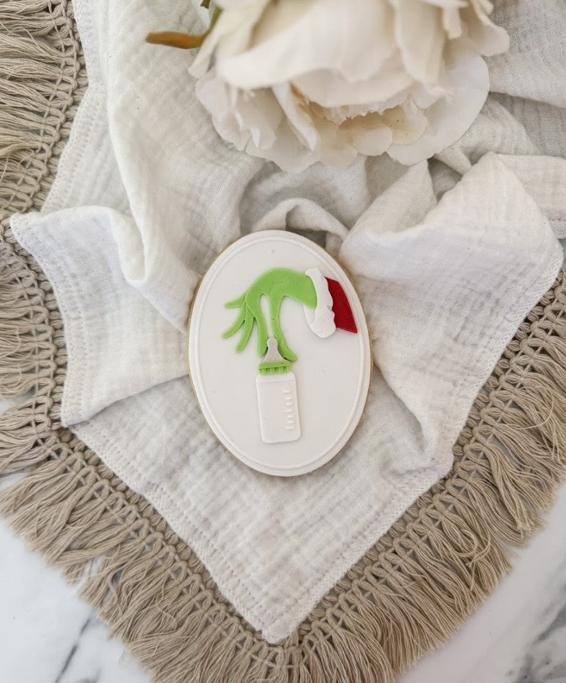 Hand with bottle frame cookie cutter and stamp